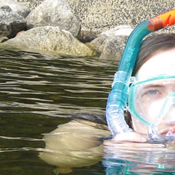 Photo of a young woman snorkling